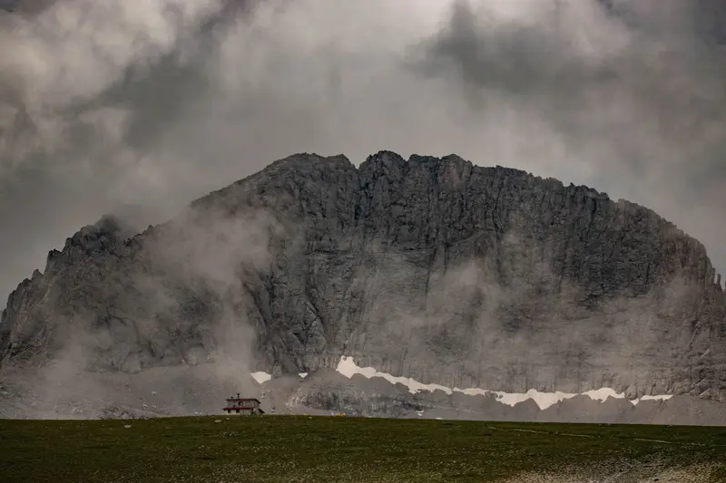 Olympus rock faces in the clouds