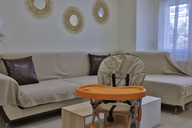 Living room with a baby high chair